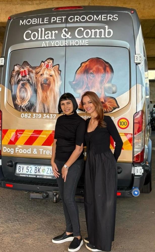Adele Naidoo and Vicky Lingley, the owners of Collar & Comb, in front of the mobile grooming van