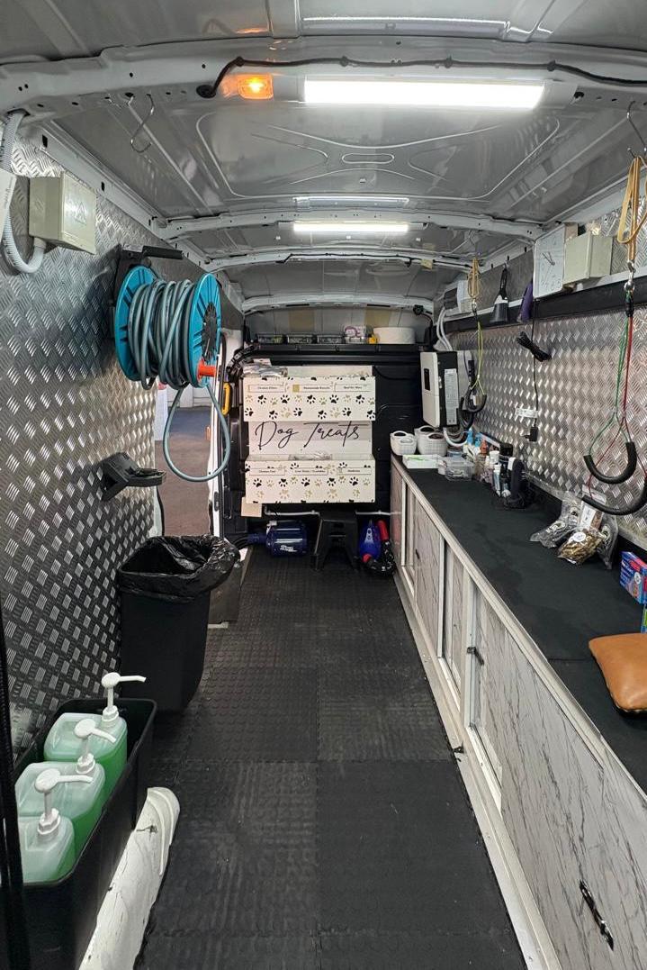 Inside the fitted-out Collar & Comb mobile grooming van